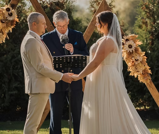 Jeff Sager officiating an outdoor wedding ceremony